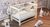 Кроватка детская ДУБОК "Элит" шарнир-пидшибник с откидной боковиной + резьбой, дерево бук (Слоновая кicтка) DU-22 фото